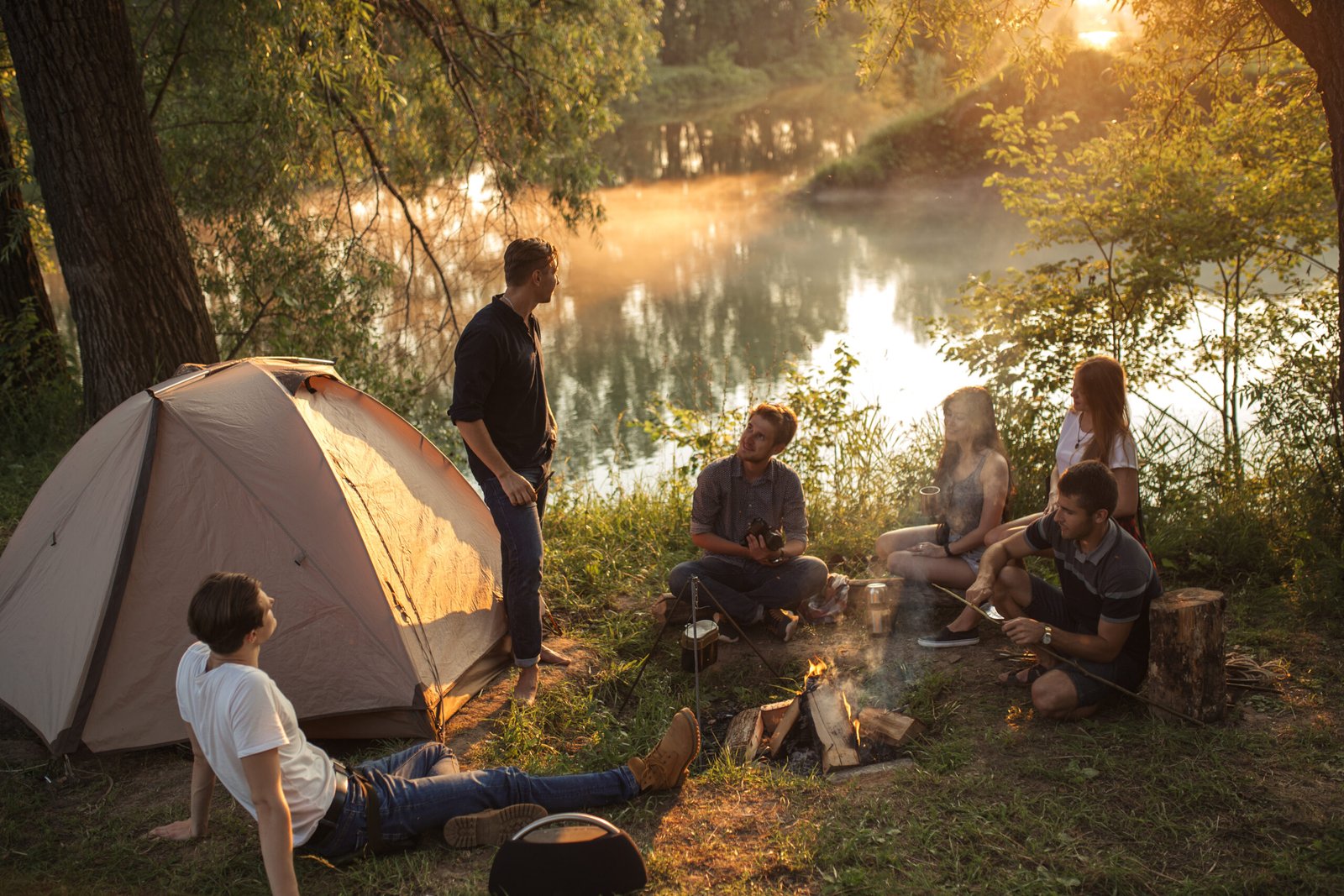 a group of tourists are spending great time in the picturesque place in the evening